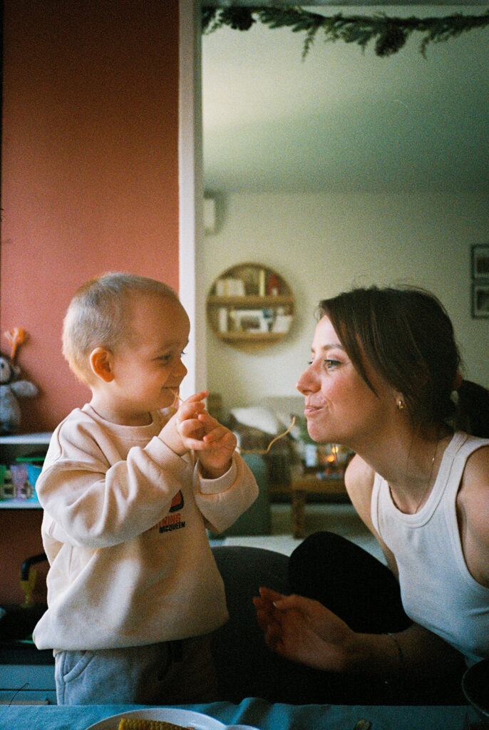 motherhood photography mun and son playing with pasta